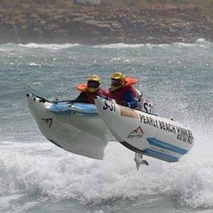  â€˜n Aksiefoto van Rynhardt Koekemoer en Tiekie Morkel tydens die Trans Agulhas Rubberbootwedren 